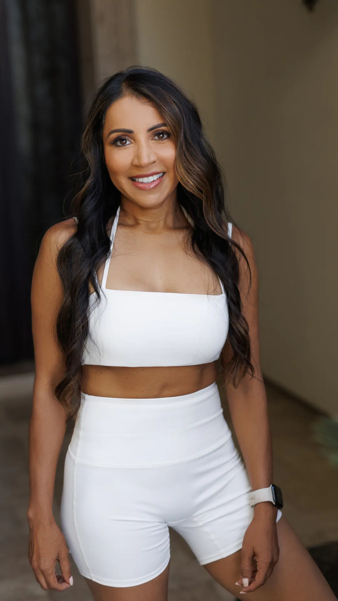 Dr. Shah white workout outfit